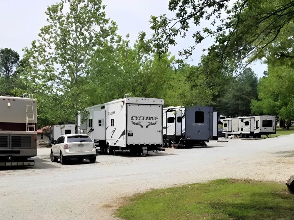 Parked RV's at site Ozark RV Park