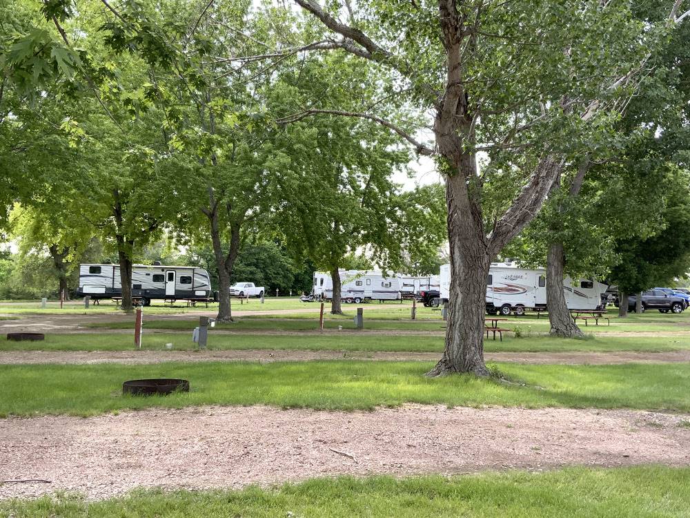 Shaded gravel sites at R & R Campground & RV Park