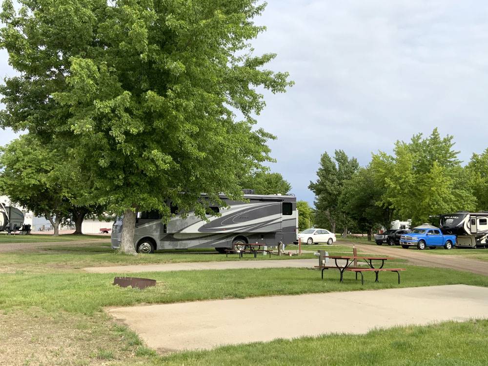 Class A motorhome parked in a gravel site at R & R Campground & RV Park