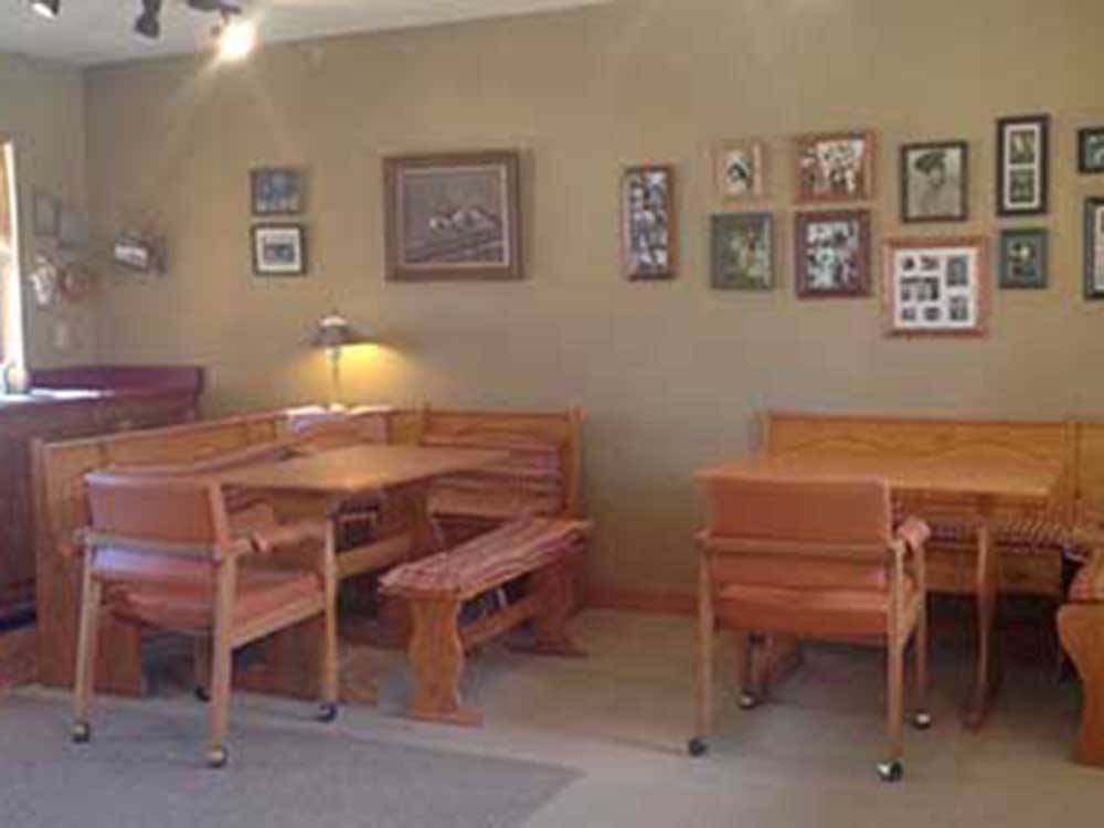 Two dining nooks in the clubhouse at GRAPE CREEK RV PARK CAMPGROUND & CABINS