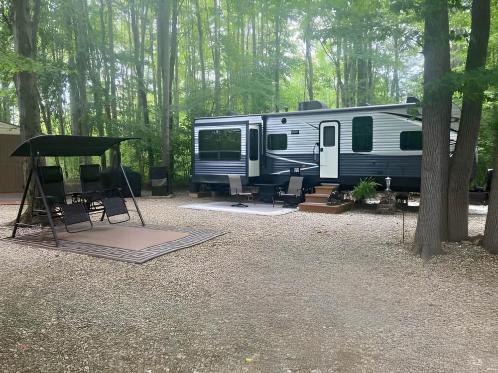Parked RV at site Hidden Lakes Family Campground
