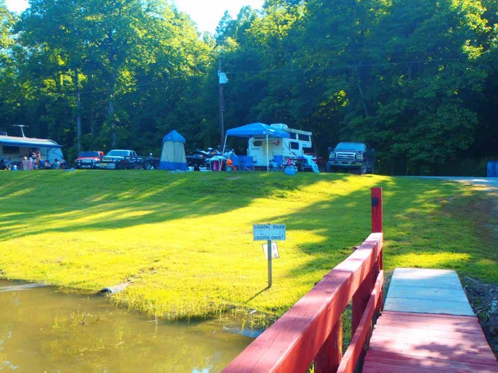 Standing on the red dock looking at the RV sites at SOARING EAGLE CAMPGROUND & RV PARK