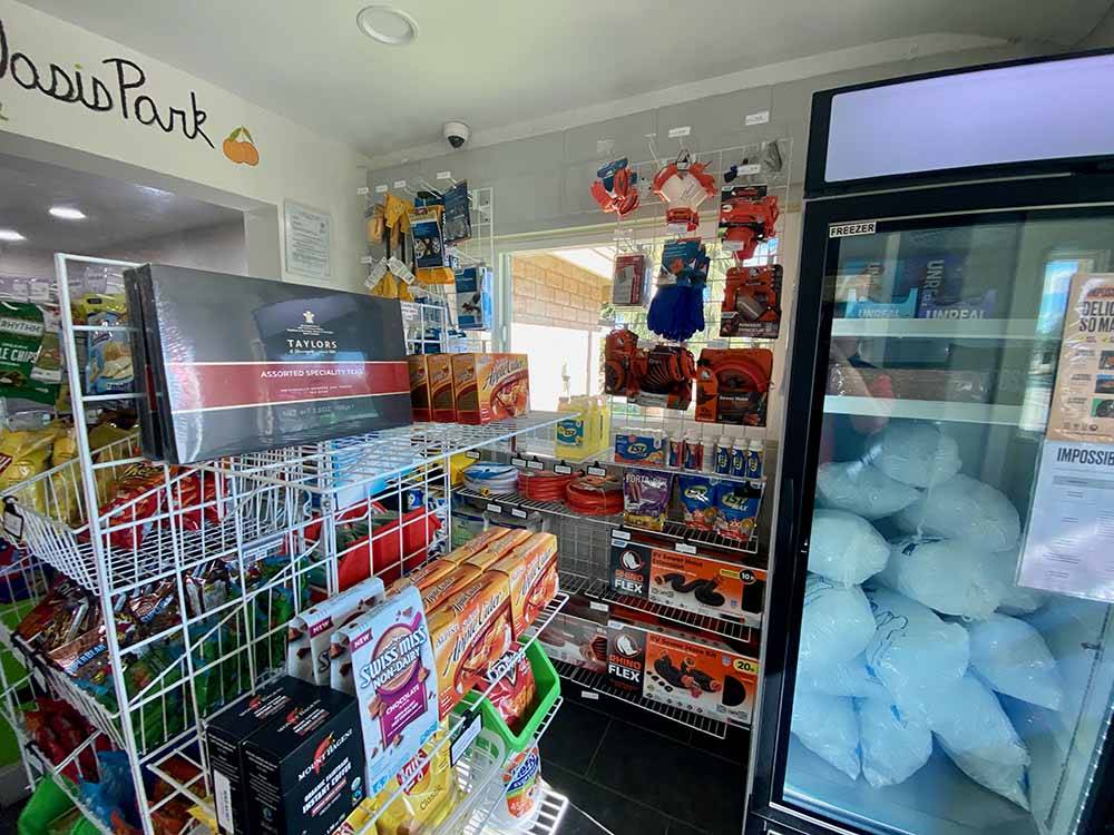 Cooler with bags of ice at general store at ALMOND TREE OASIS RV PARK