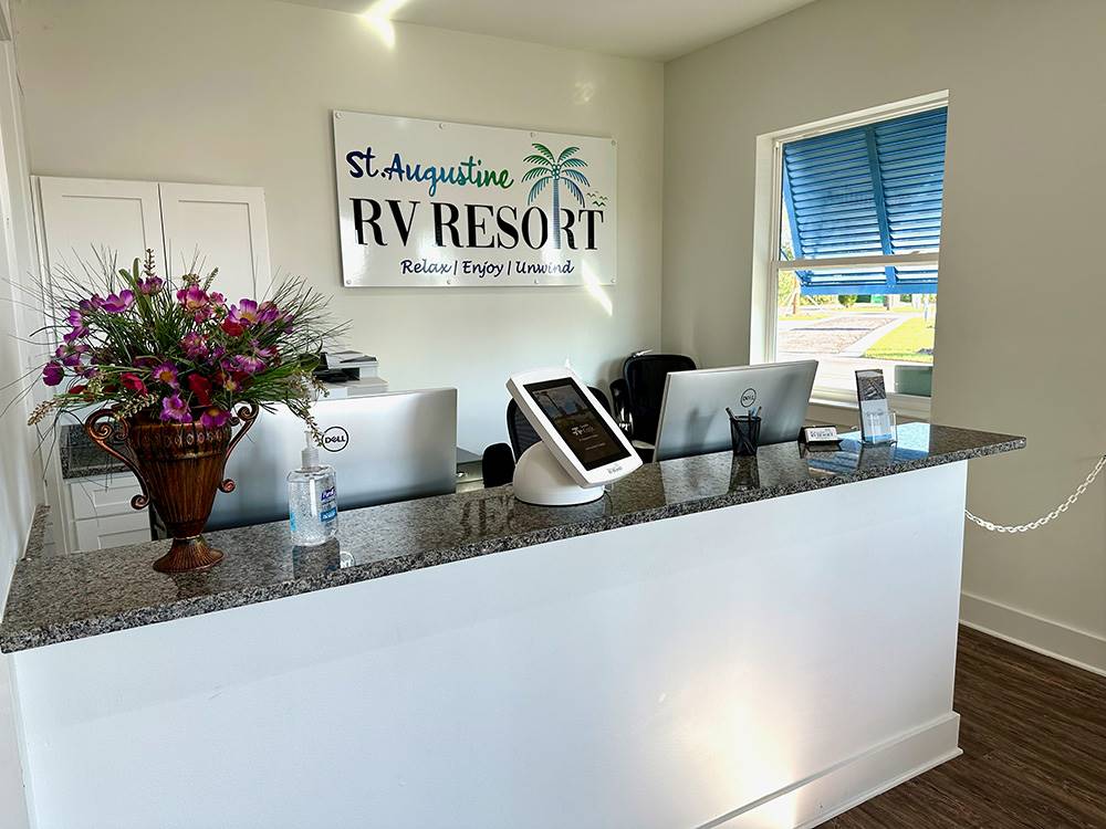 Front desk with smooth countertops at ST AUGUSTINE RV RESORT