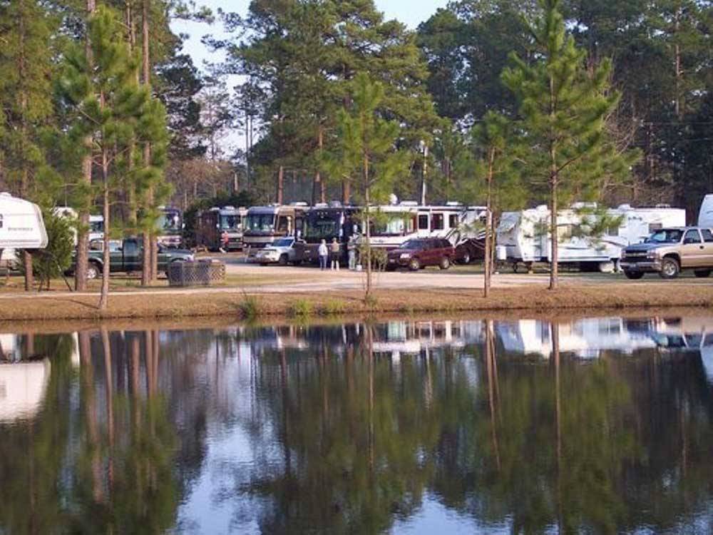 RV sites by the water at SUGAR MILL RV PARK
