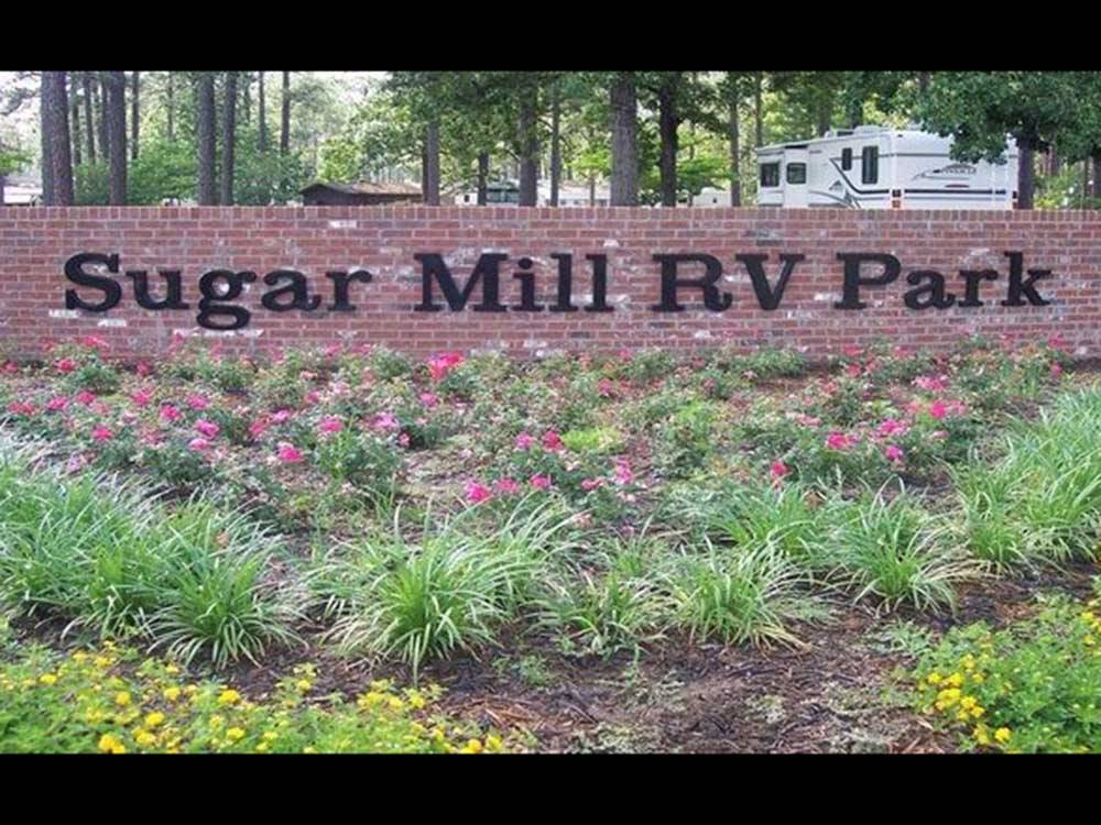 The front entrance sign at SUGAR MILL RV PARK