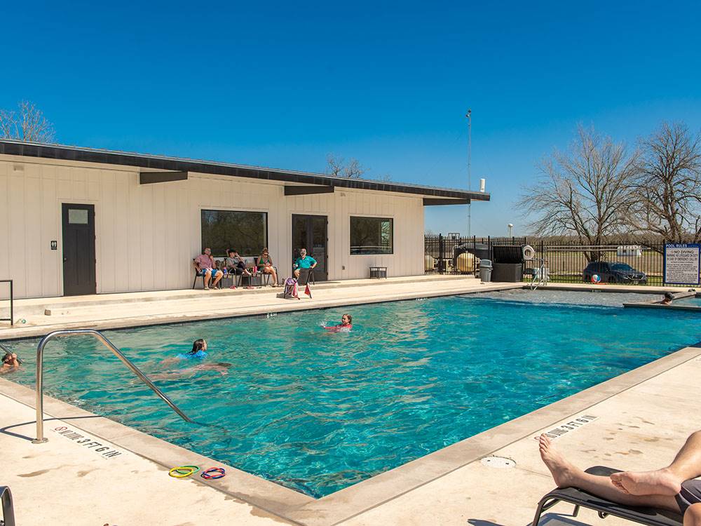 People enjoying the pool