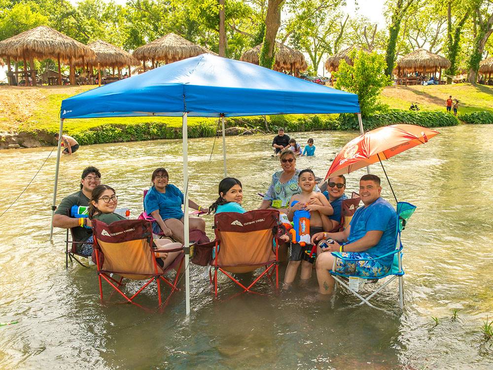 People enjoying the river