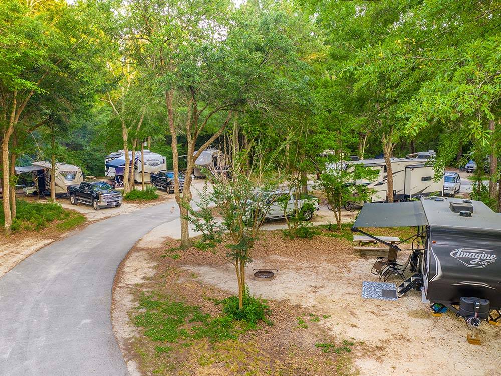 Road gently curves through RV campground at THE CAMPGROUND AT JAMES ISLAND COUNTY PARK