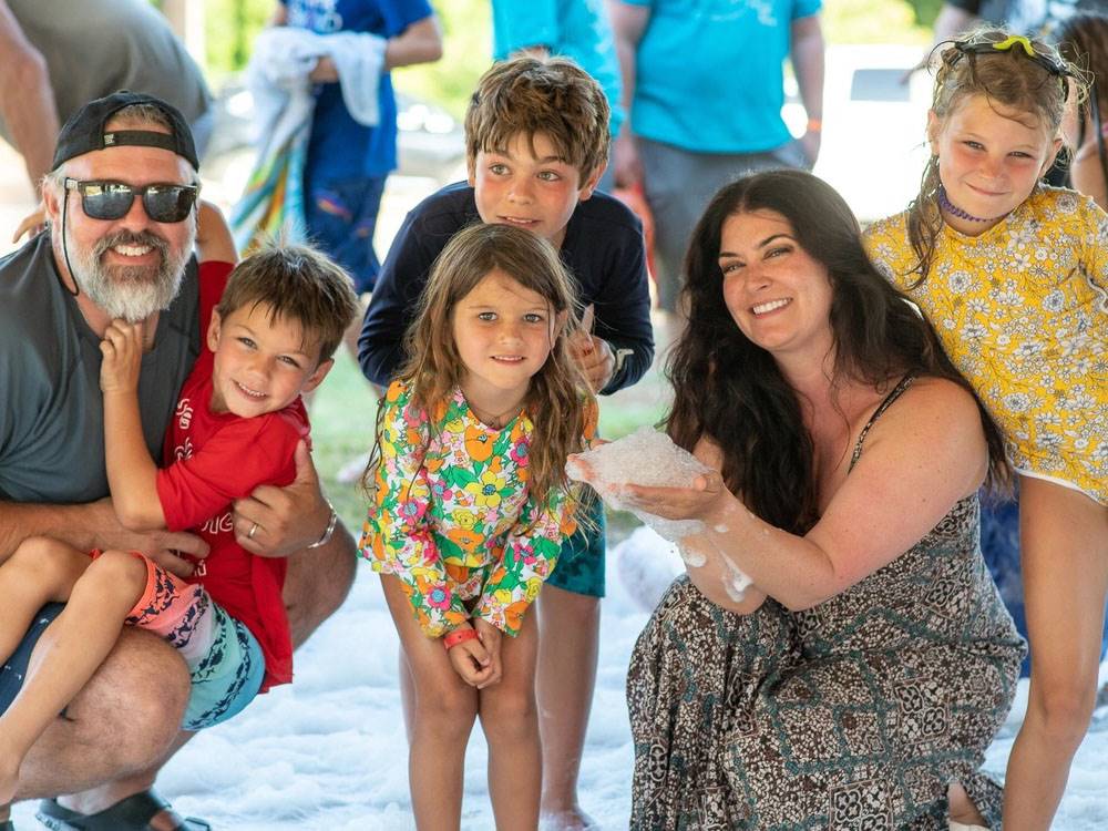 A family at a foam party