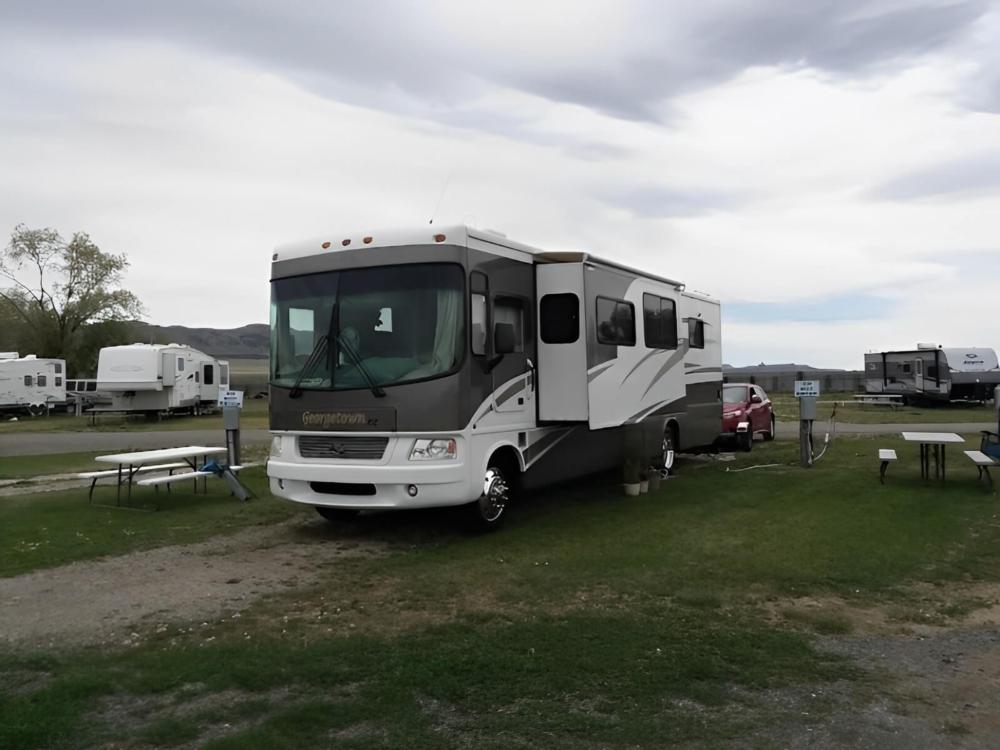 RV parked at The Hitching Post RV Park