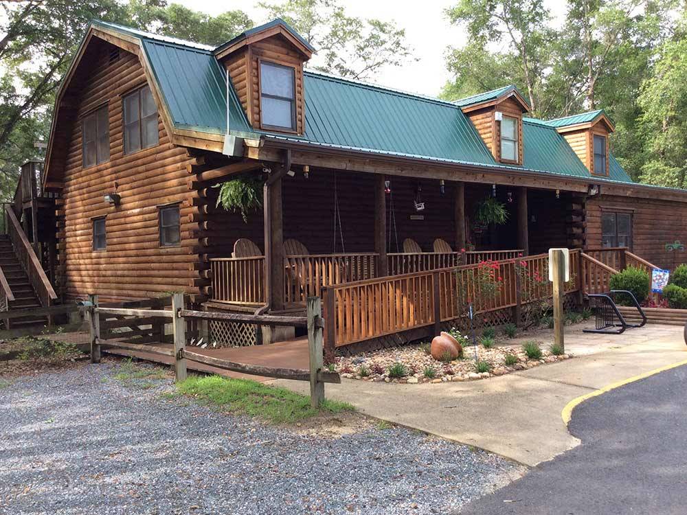 Log Cabin with deck at FLAT CREEK FAMILY CAMPGROUND
