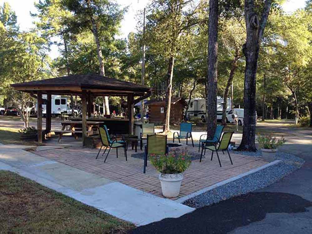 A gazebo and fire pit at FLAT CREEK FAMILY CAMPGROUND