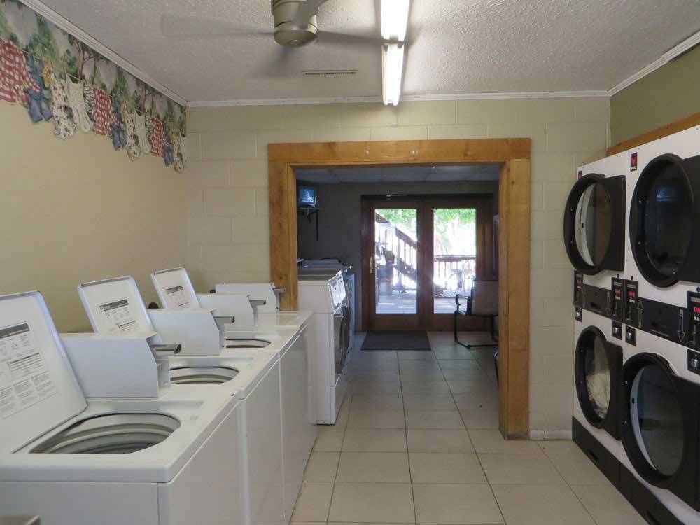 The clean laundry room at TRIPLE 'J' RV PARK
