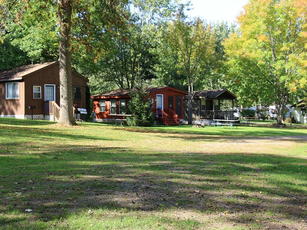 A row of rustic rental cabins at LAKE BLUFF CAMPGROUND