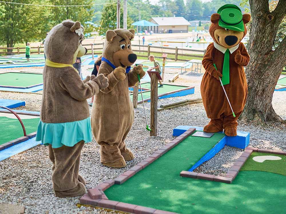 Yogi Bear and friends playing miniature golf at JELLYSTONE PARK AT MAMMOTH CAVE