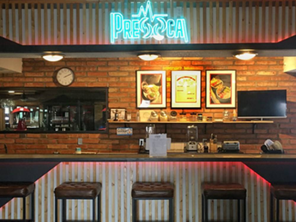 The smoothie shop bar counter with stools at Lifestyle RV Resort
