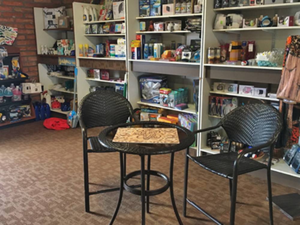 Inside the store with table and seating at Lifestyle RV Resort