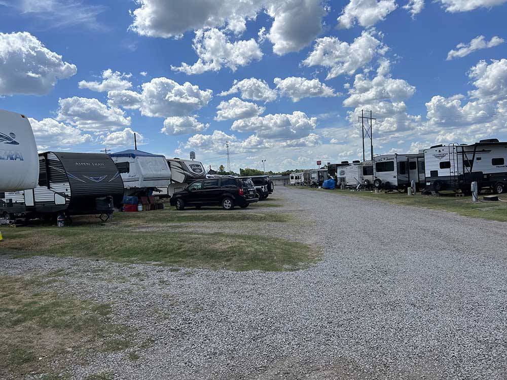 The gravel road between RV sites at OVERLAND RV PARK