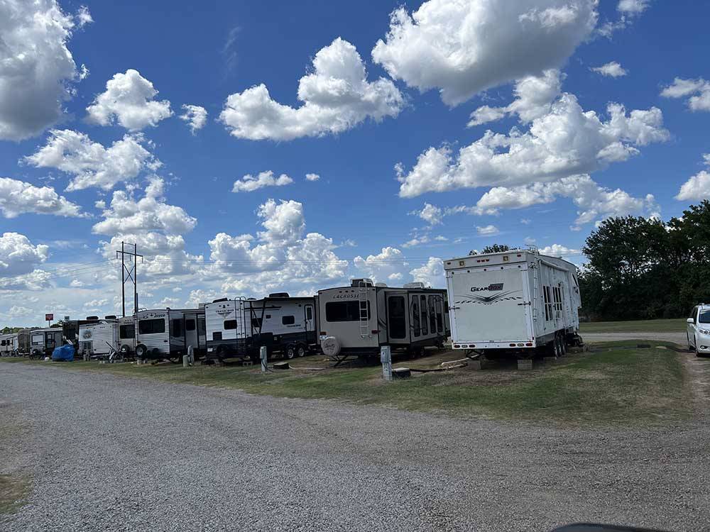 A row of full RV sites at OVERLAND RV PARK