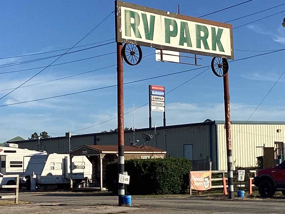 The front entrance sign at OVERLAND RV PARK