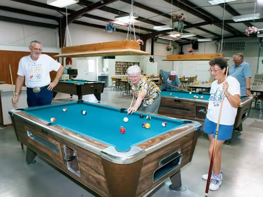 Guest playing pool