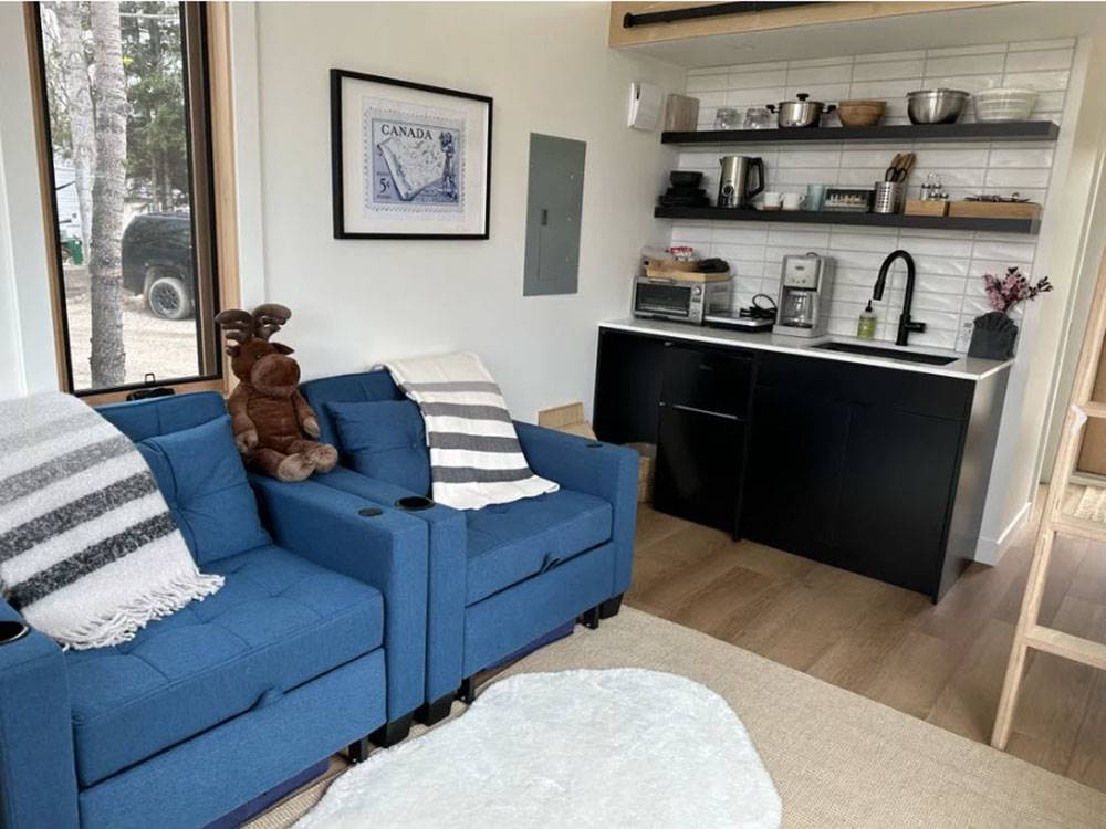 Chair and kitchenette in the rental