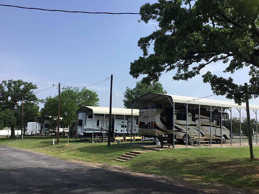 Paved, back in covered RV sites at MOCKINGBIRD HILL RV PARK