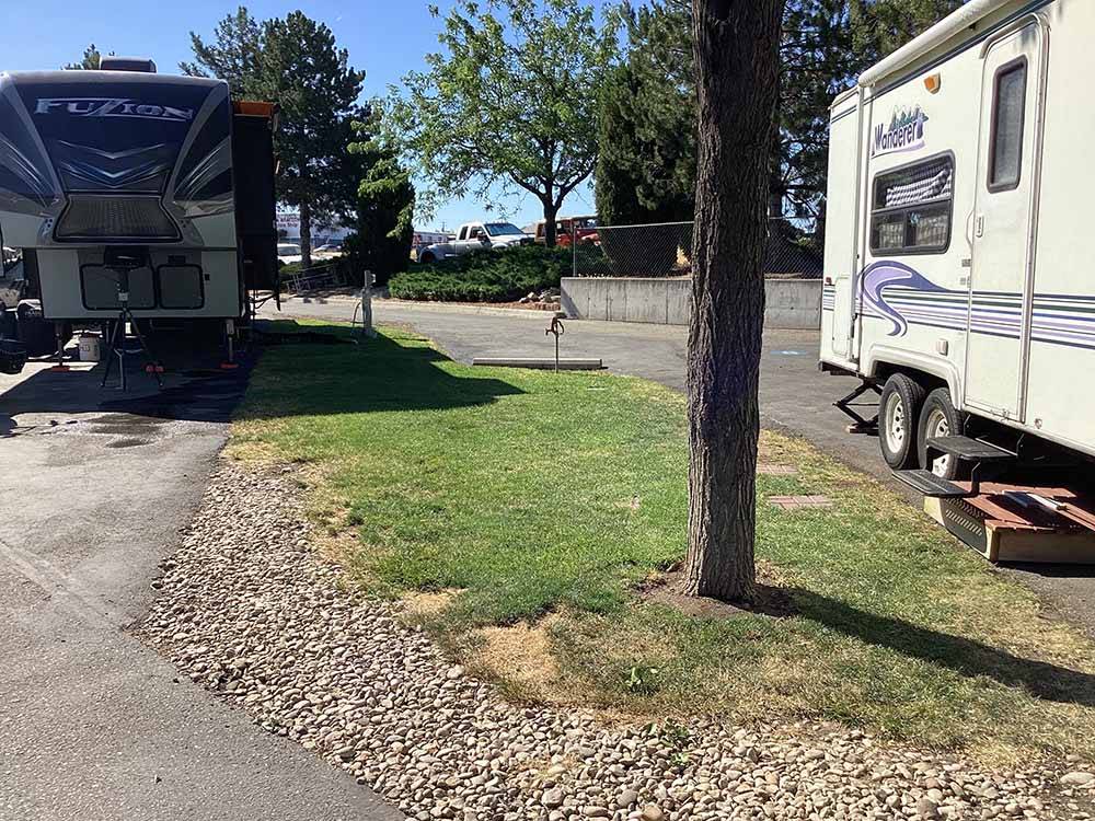 Trailers parked in paved sites at MOUNTAIN VIEW RV PARK