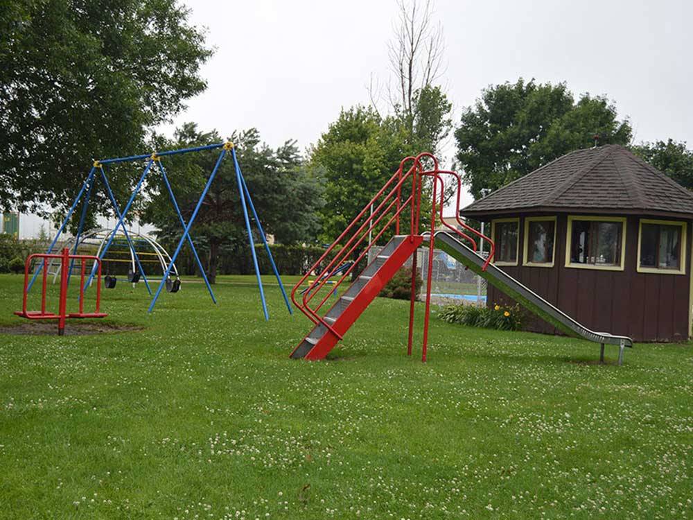 Playground with swing set at INTERSTATE RV PARK