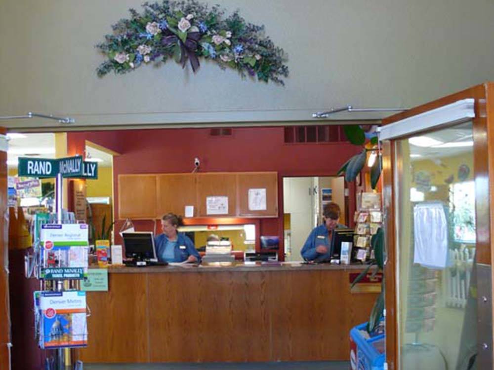 Front desk with wreath above clerk at DAKOTA RIDGE RV RESORT