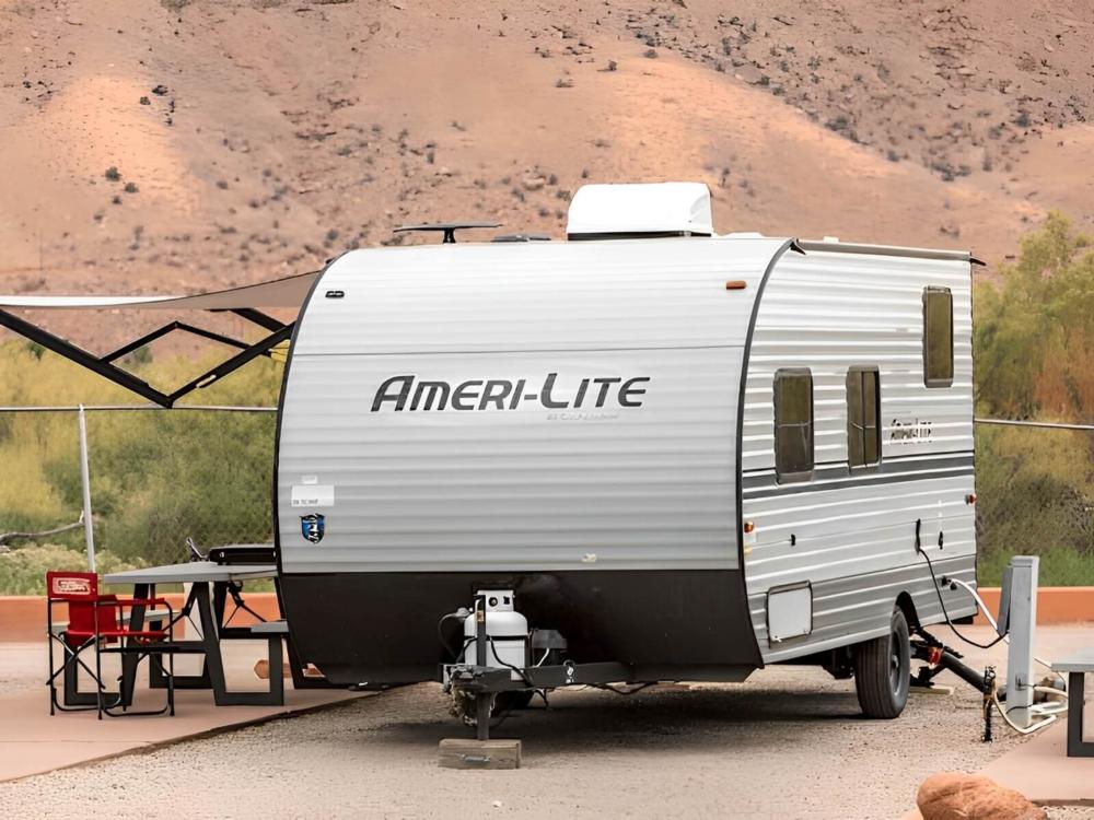 Parked trailer at site Sun Outdoors Arches Gateway