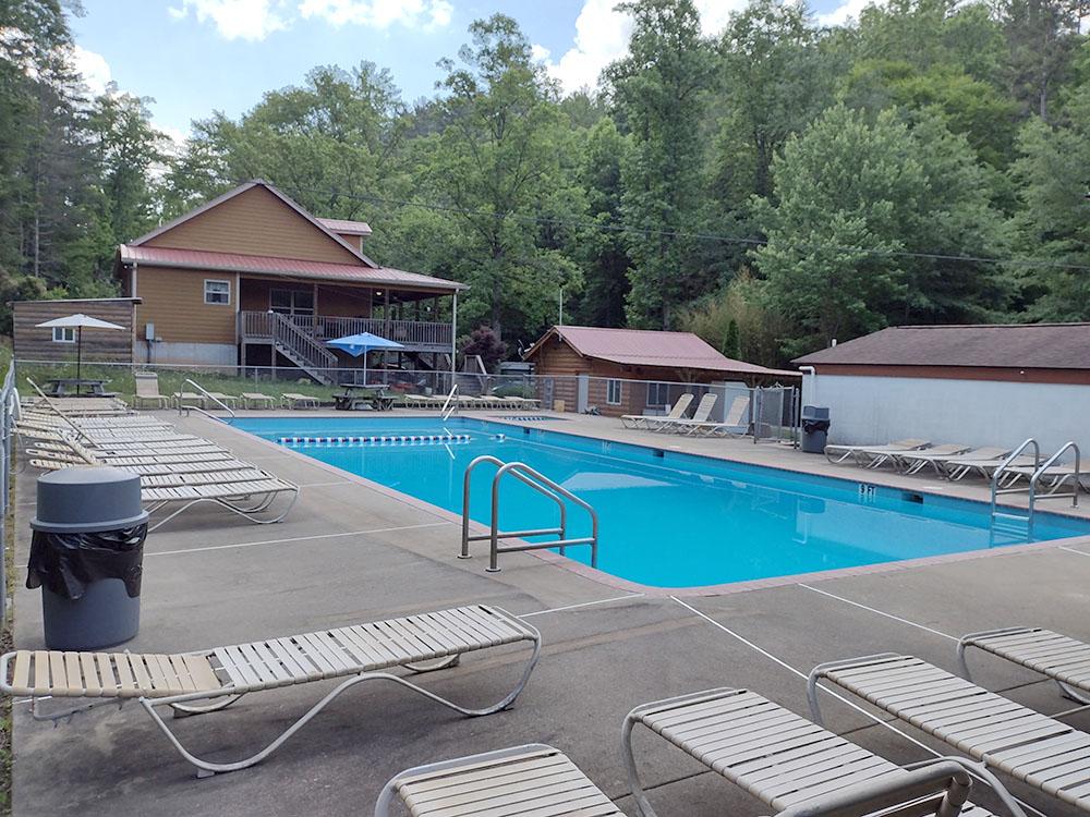 Pool area at WHISPERING PINES CAMPGROUND & RV PARK