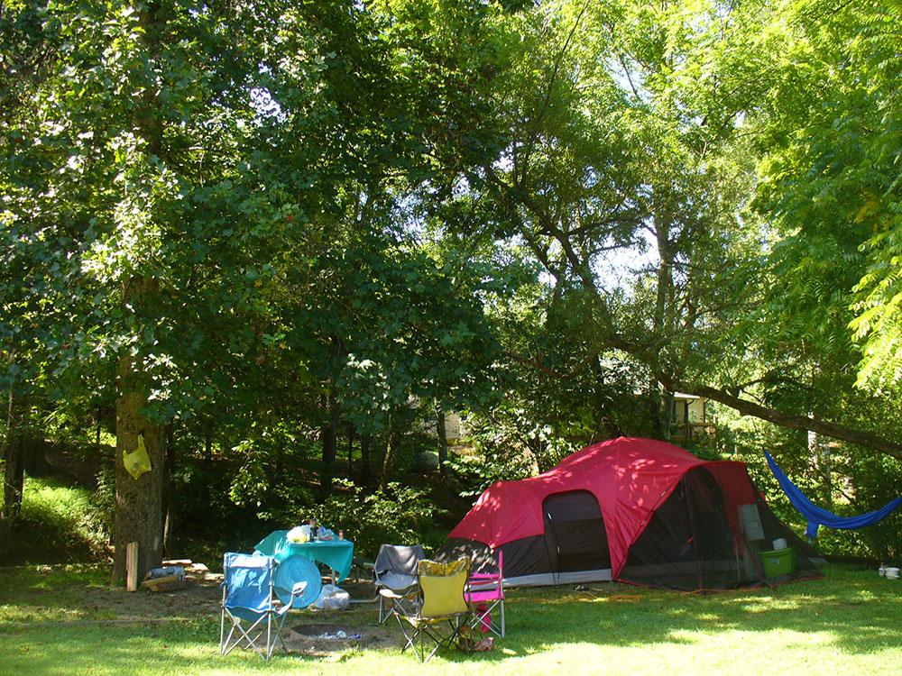 Tent site at WHISPERING PINES CAMPGROUND & RV PARK