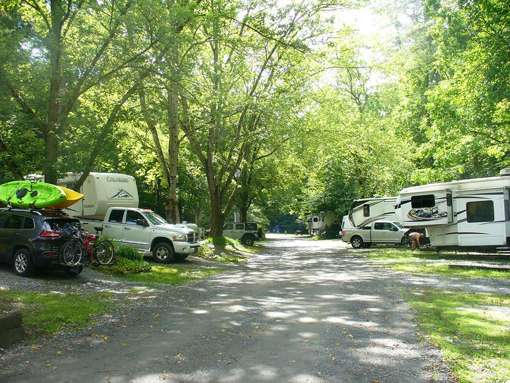 Road through RVs at WHISPERING PINES CAMPGROUND & RV PARK