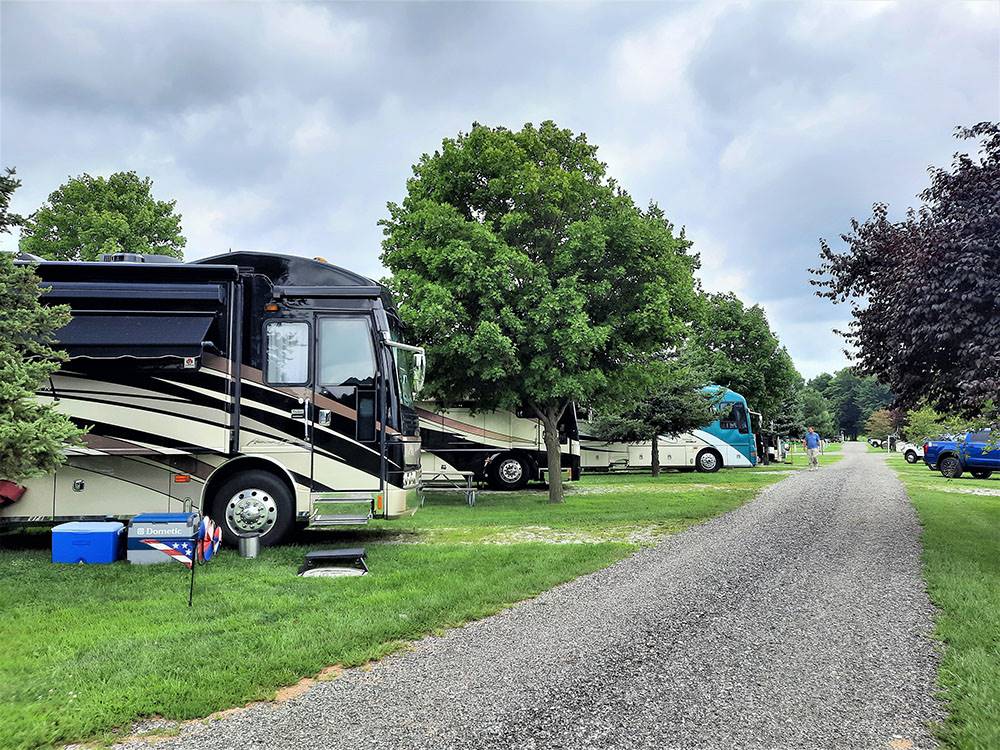 The gravel road next to the parked RVs at SHIPSHEWANA CAMPGROUND SOUTH PARK