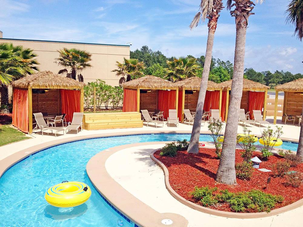 The lazy river with cabanas in the background at HOLLYWOOD CASINO RV PARK- GULF COAST