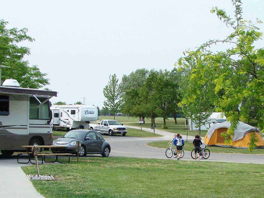 Trailers and tents camping at SAUDER VILLAGE CAMPGROUND
