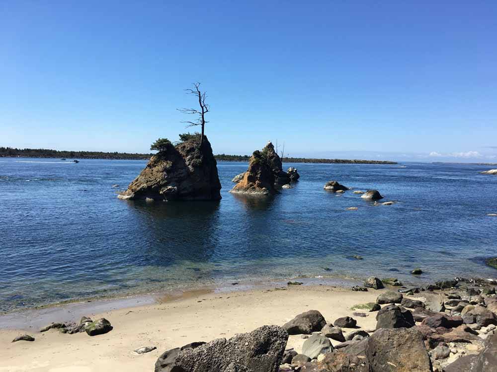 Two rock formations in the water at TILLAMOOK BAY CITY RV PARK