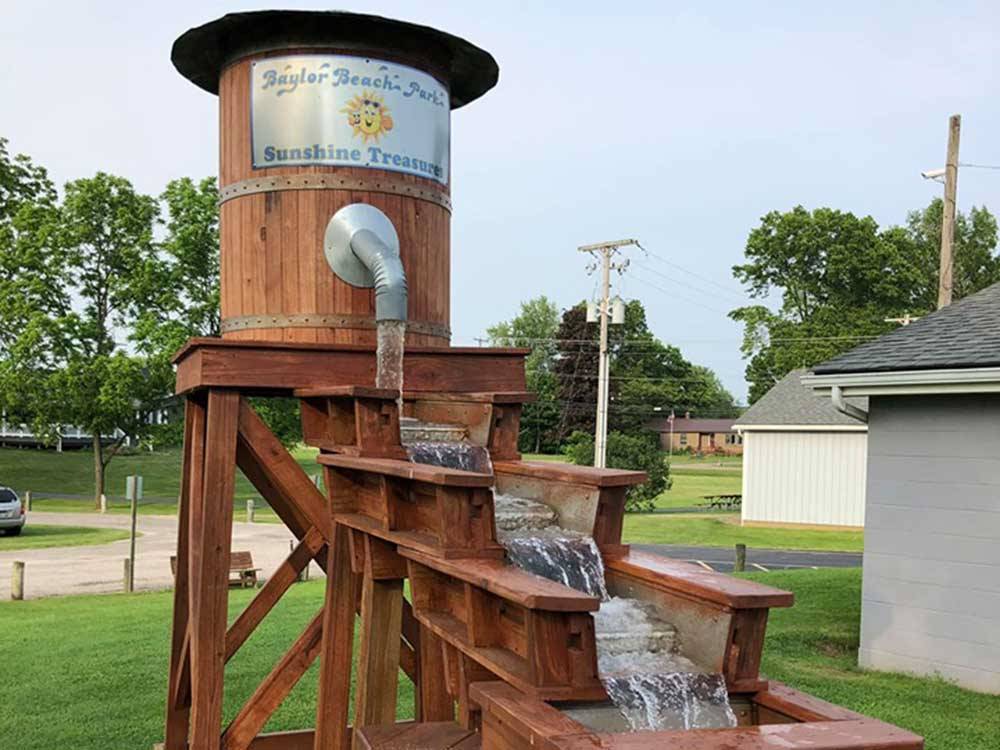 Small wood water tower at BAYLOR BEACH PARK WATER PARK & CAMPGROUND