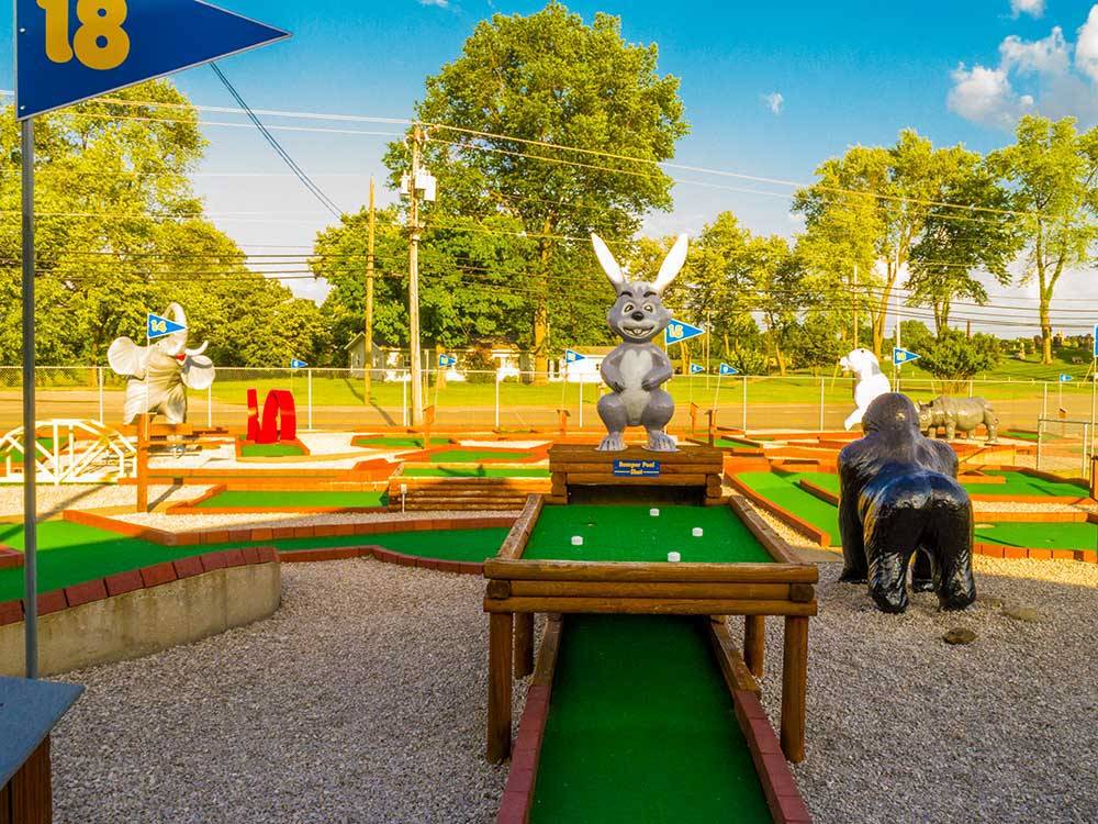 Mini-golf course with animal figures at BAYLOR BEACH PARK WATER PARK & CAMPGROUND