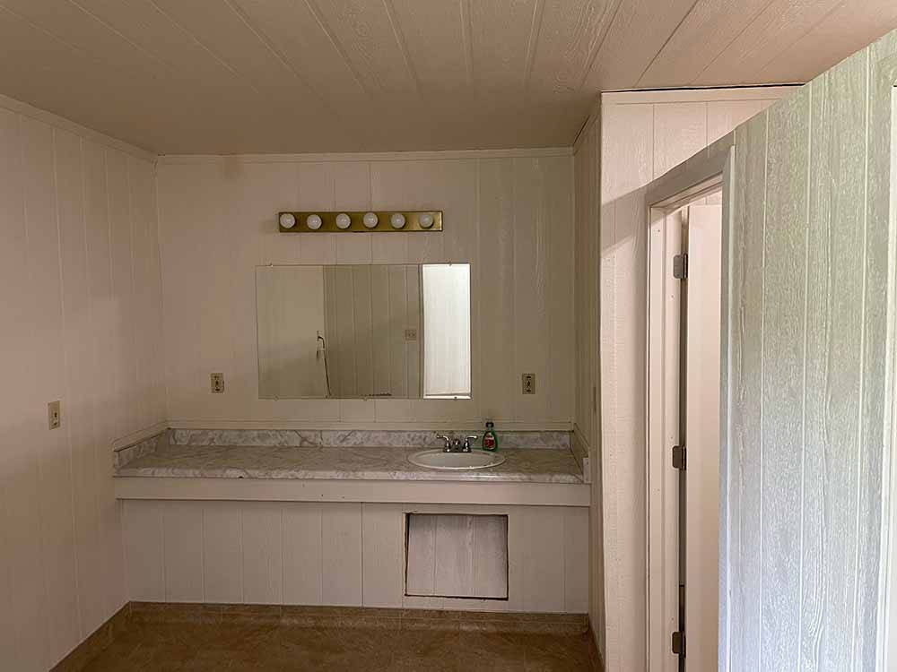 Inside of the bathroom at BAUER'S CANYON RANCH RV PARK