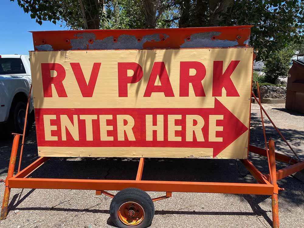 The front entrance sign at BLUE SPRUCE RV PARK