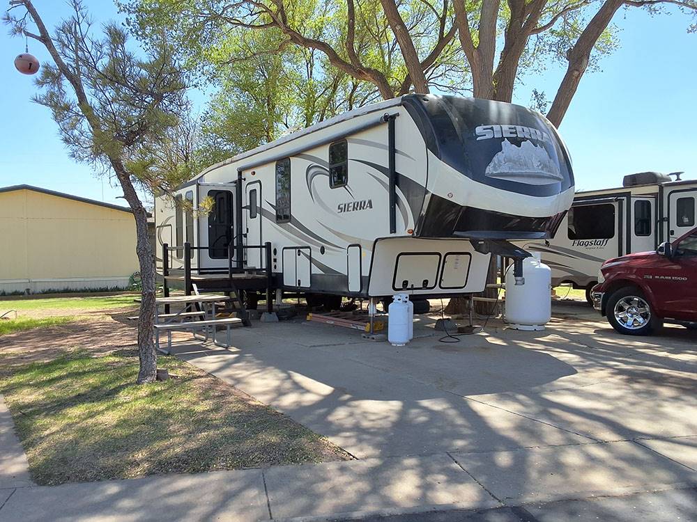 A fifth wheel in a paved site