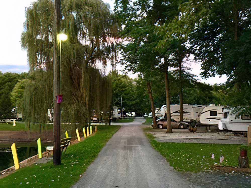 A gravel road leading to the RV sites at BLUEGRASS CAMPGROUND