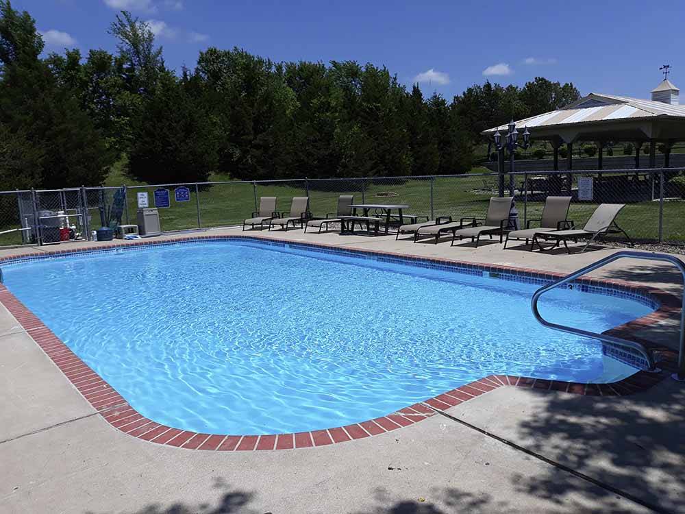 The swimming pool area at COTTONWOODS RV PARK
