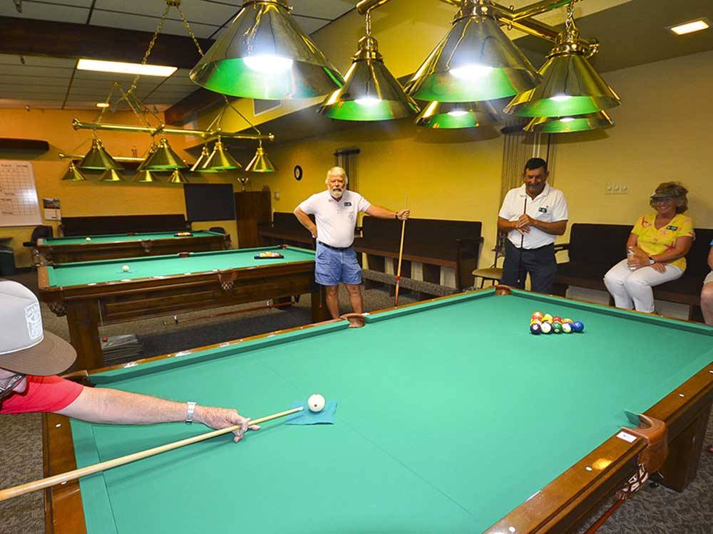 Campers playing pool at SUN LIFE RV RESORT