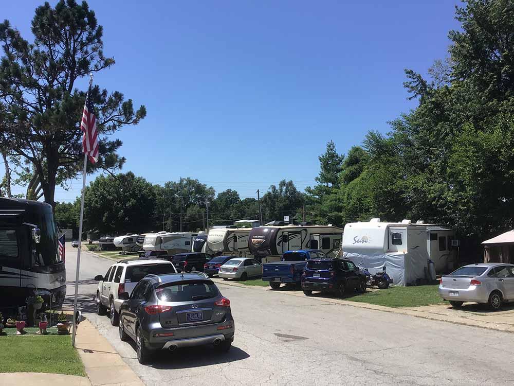 View down the road of campers in sites at BEACON RV PARK