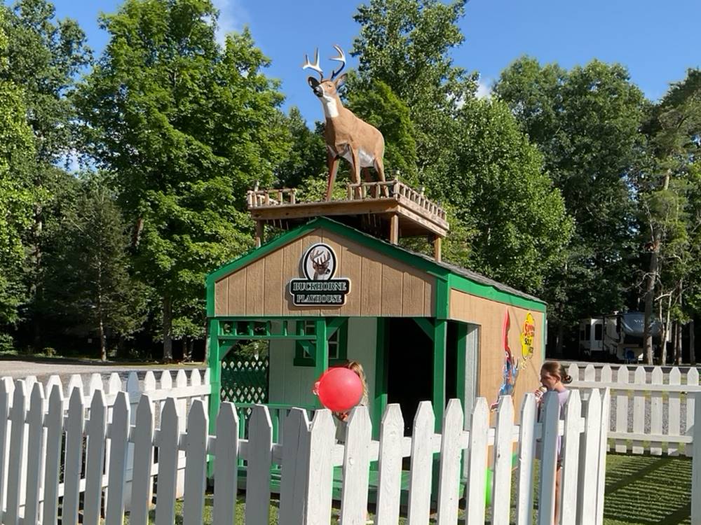 Fenced playhouse at Buckhorne Country Store and Campground