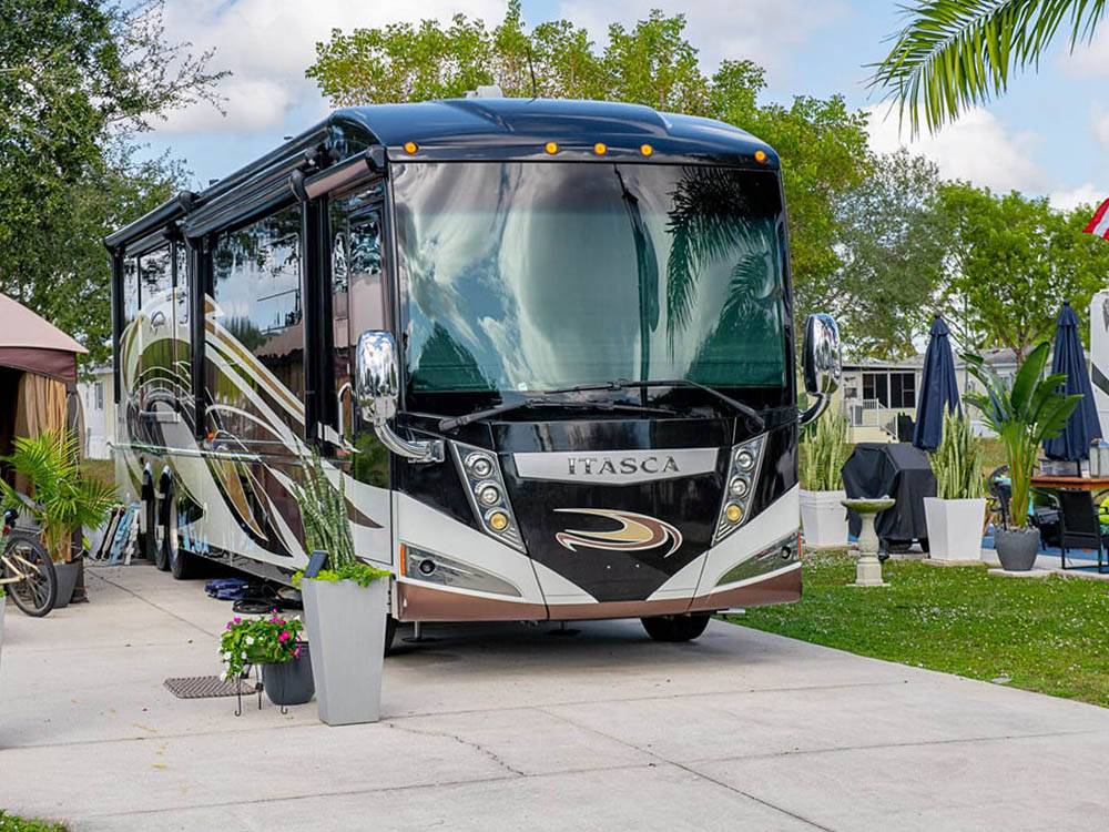 A large motorhome in a paved site